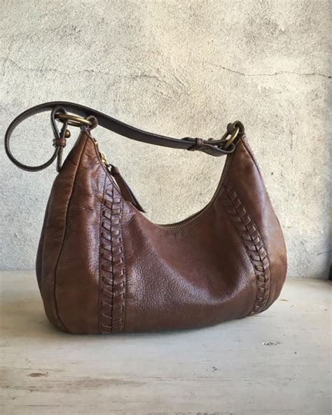 fake d&g vintage brown hobo bags|fancy d symbol.